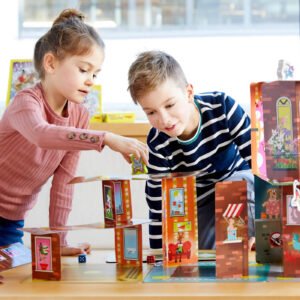 Boy watching a girl placing an elephant game piece on top of a card tower playing Rhino Hero Super Battle in front of a sunny window